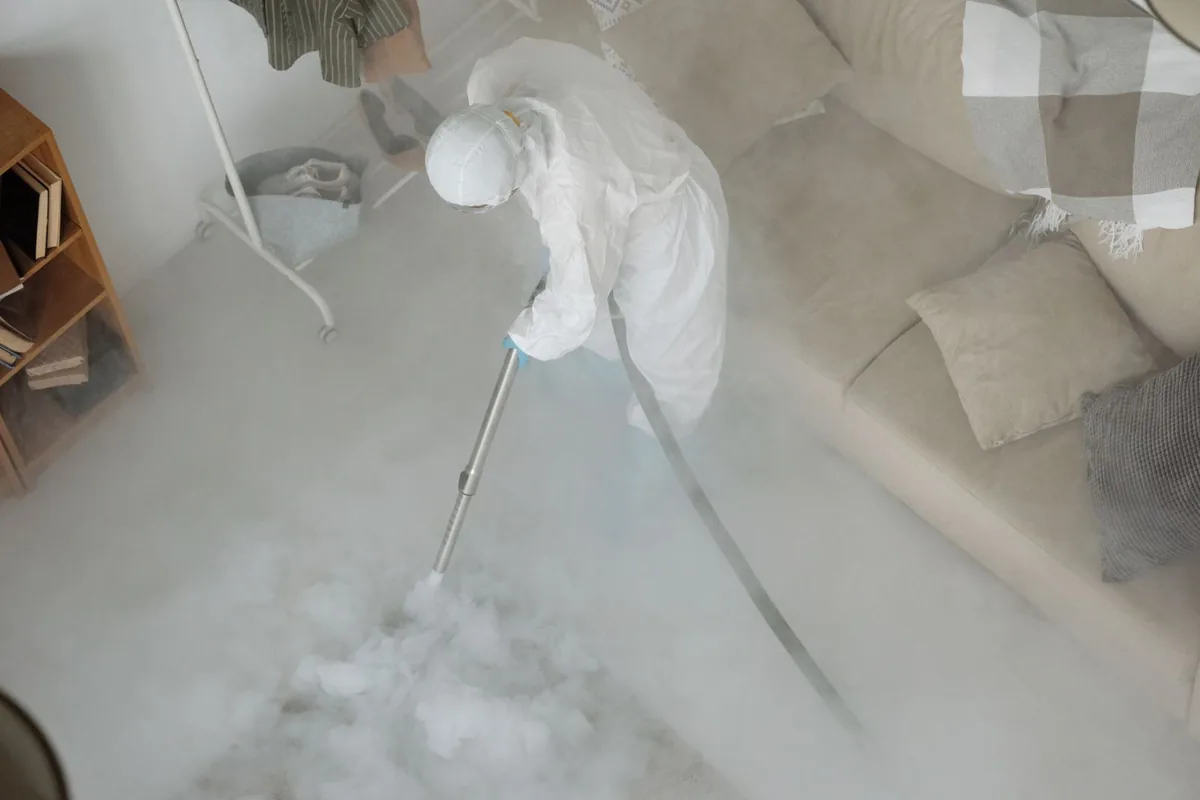 Biohazard cleanup technician in protective equipment, Haverhill, FL